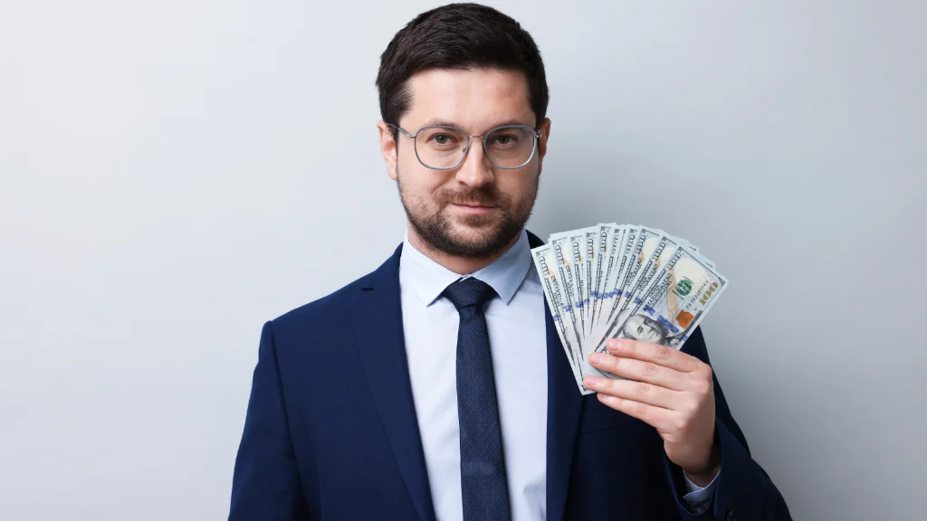 Young professional planning budget and savings after receiving first salary.