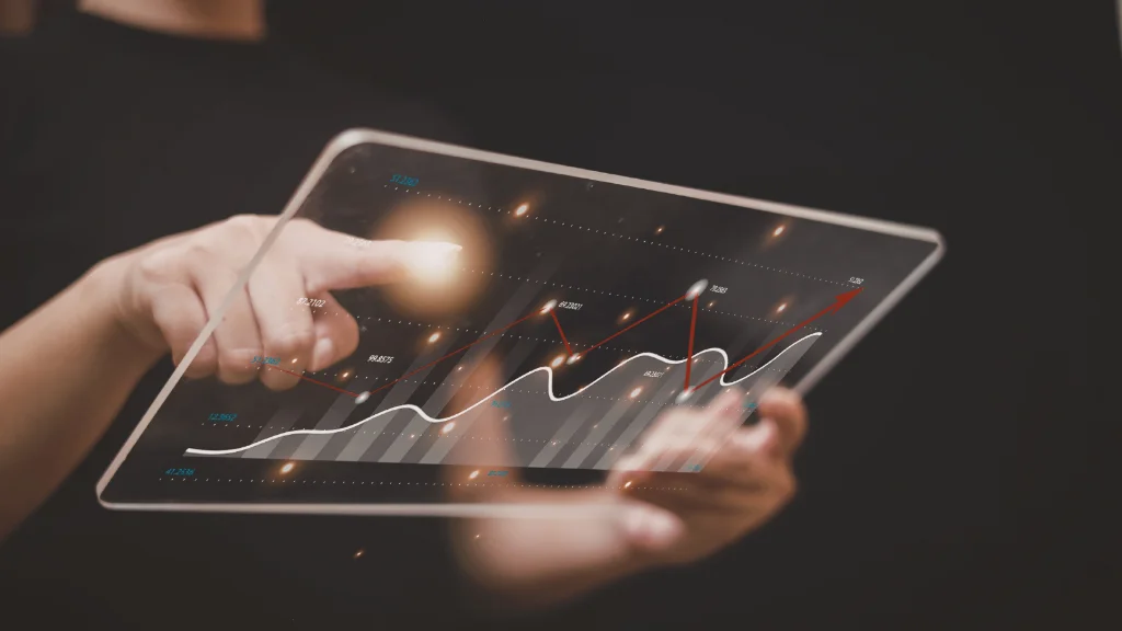 Global market screens reflecting US economic data impacting Indian equities